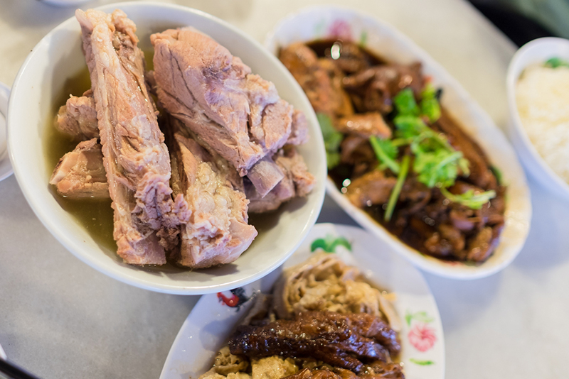Bak kut teh with side dishes and rice